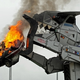 Illustration for article titled Behold The Car-Crushing Fury Of Robosaurus!